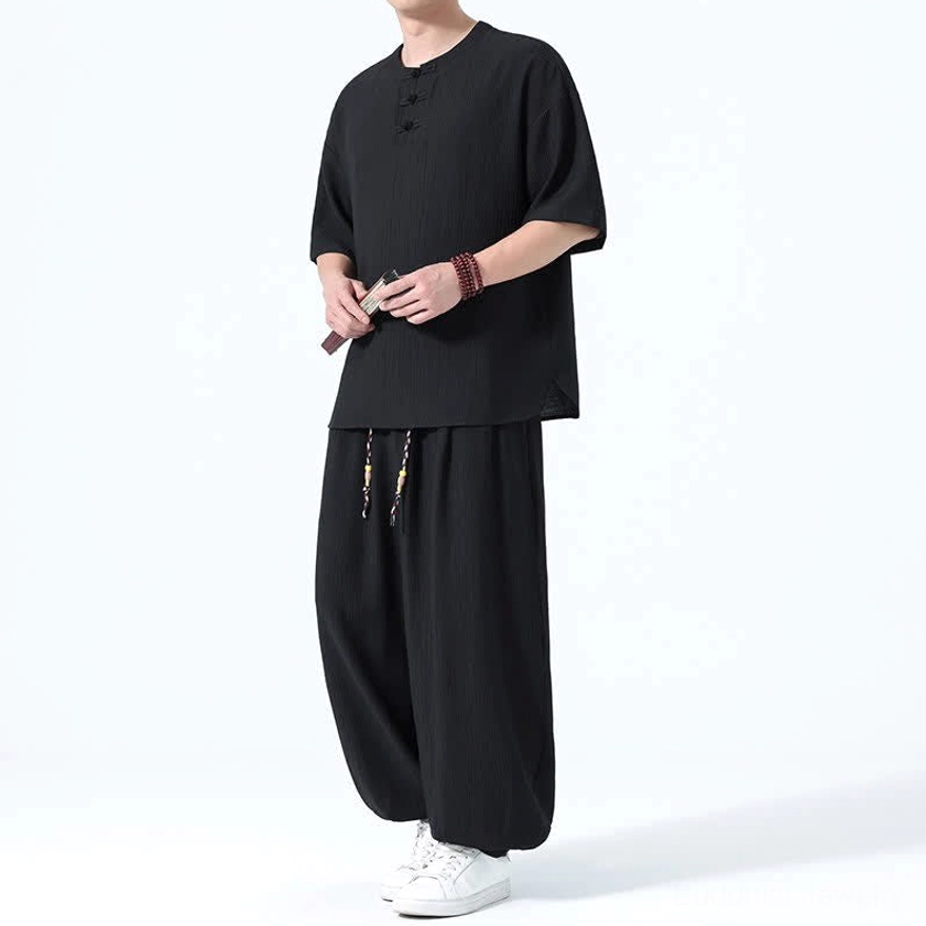 Men's Buddhist inspired meditation wear black color left three-quarter view frog button neckline
