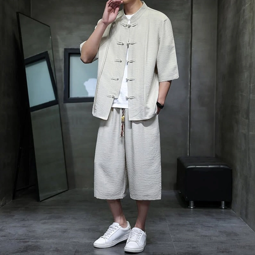Men's meditation suit side profile showing sleeve length and pants fit for mindfulness practice