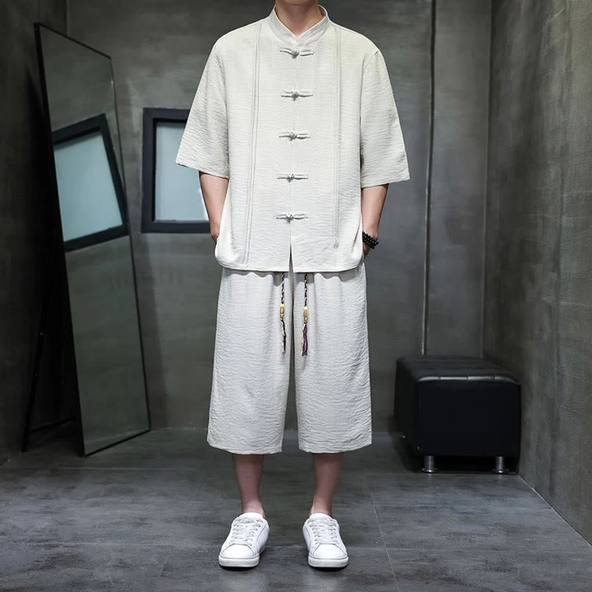 Men's zen meditation tang suit full front view with mandarin collar and frog buttons in beige linen blend fabric