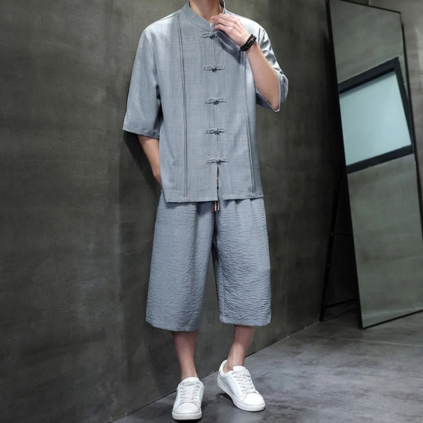 Full-length view of men's zen meditation two-piece clothing set with functional design