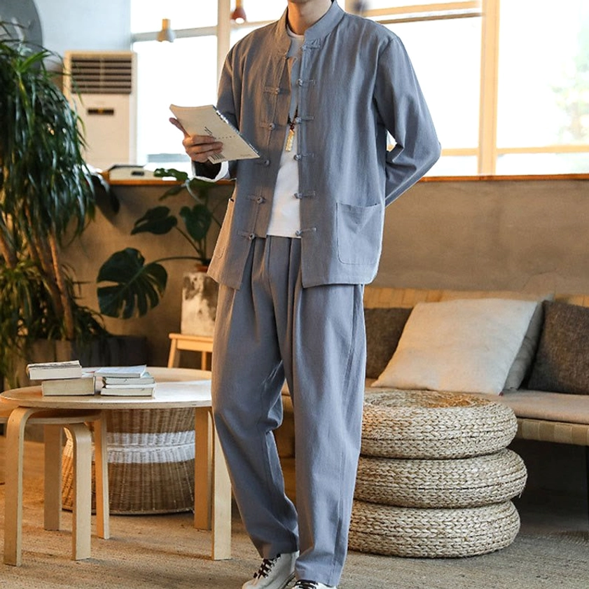 Zen Tang suit for men showing side pockets and contrast white cuffs design detail