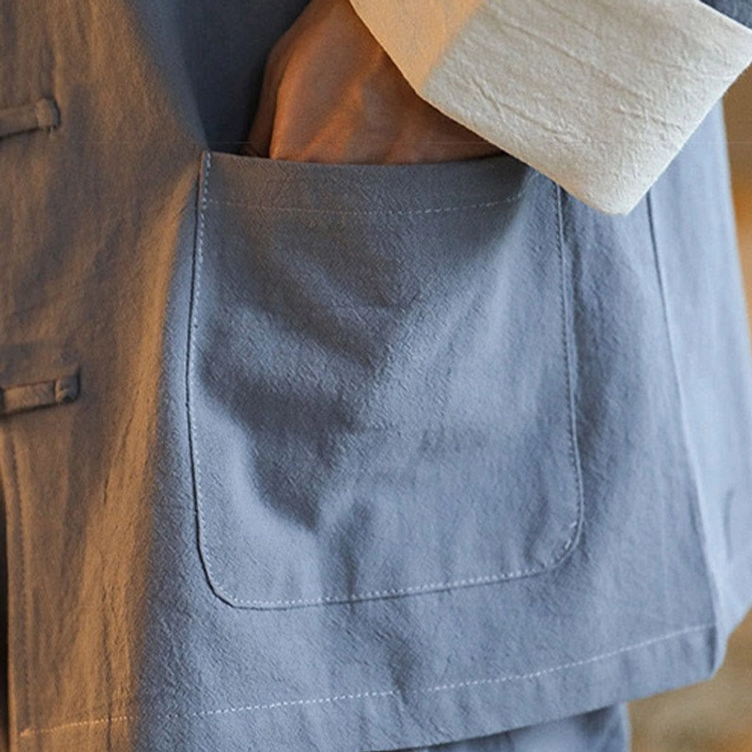 Men's traditional Zen Tang suit with elastic waistband and functional pockets for comfort