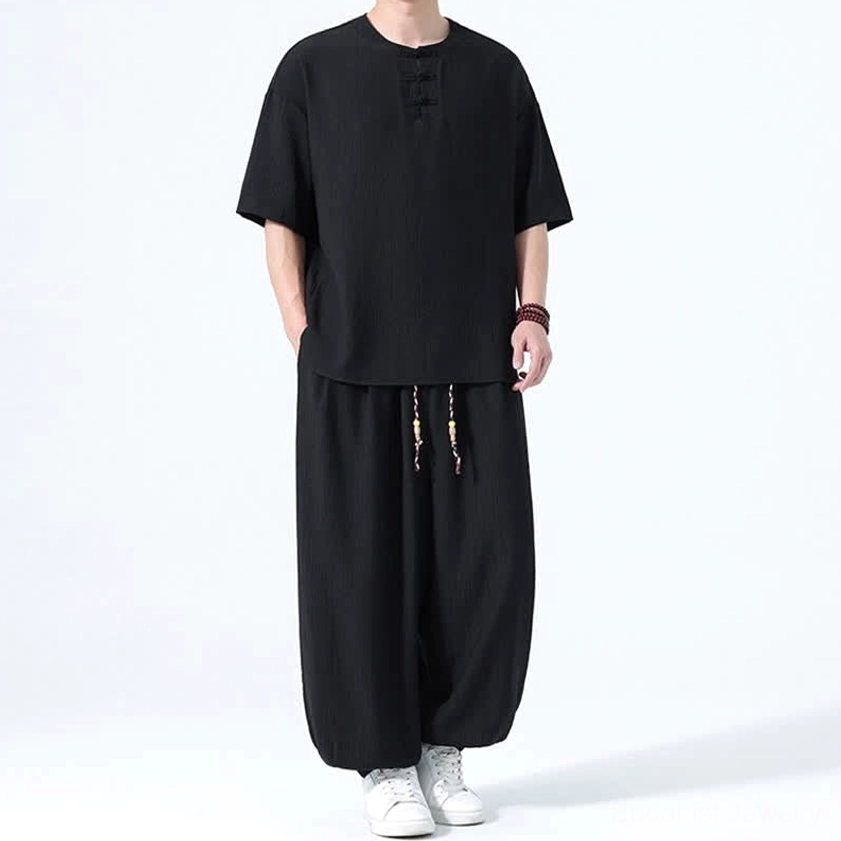 Men's mindfulness linen set black left three-quarter view frog button shirt harem pants