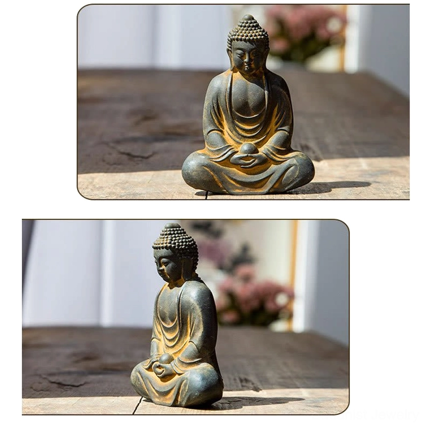 Compact meditating Buddha ornament statue in rounded frame, dark grey with rustic yellow texture