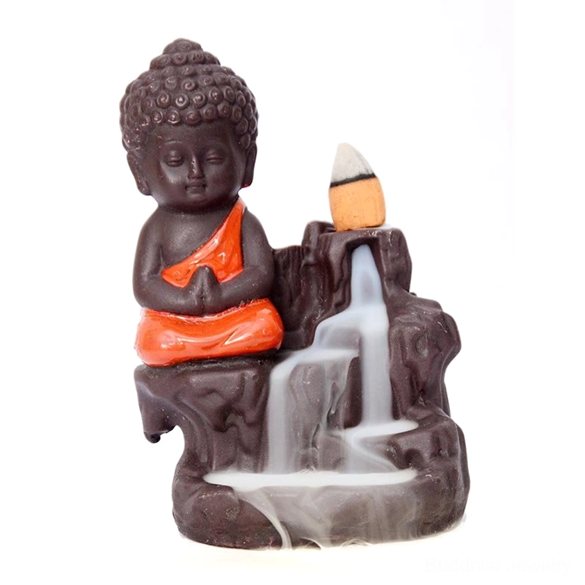 Monk backflow incense burner frontal view on white background with orange robe and clasped hands design