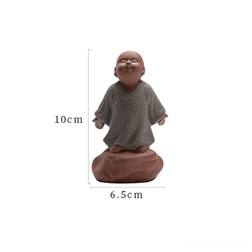 Ceramic monk statue technical specifications chart showing 10cm height and 6.5cm base dimensions