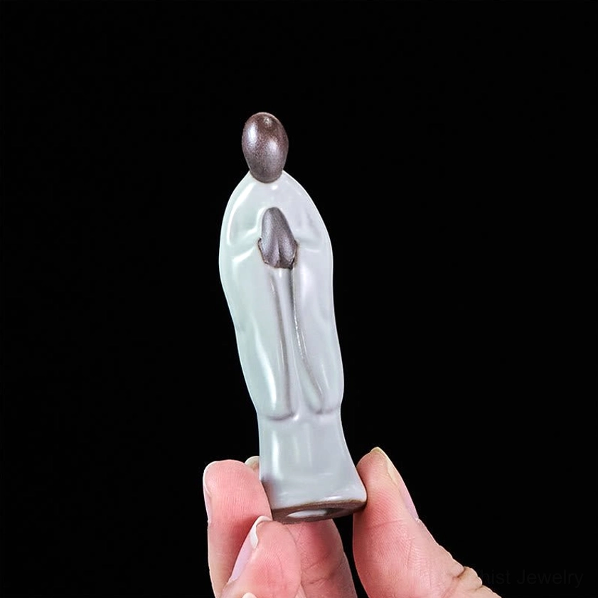 Handcrafted ceramic Buddhist monk statue for yoga studio meditation room workspace