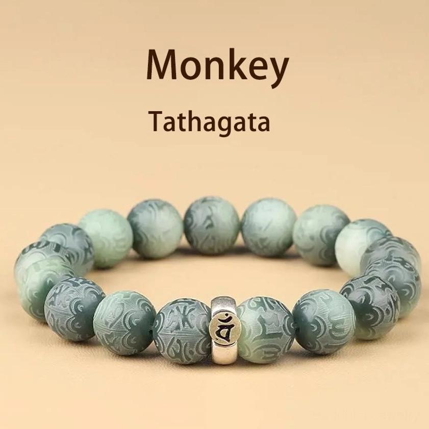Monkey zodiac natal Buddha bracelet displaying sharp Tathagata Buddha charm and beads