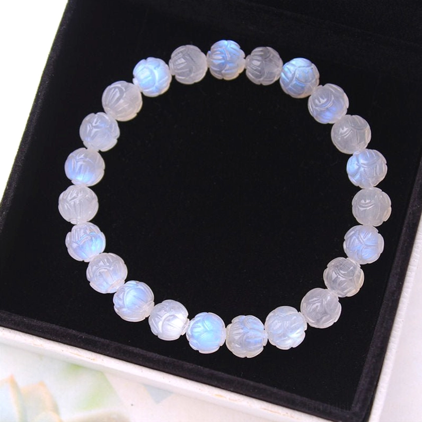 Buddhist moonstone lotus bracelet packaged presentation with spiritual significance and elegant gift wrapping