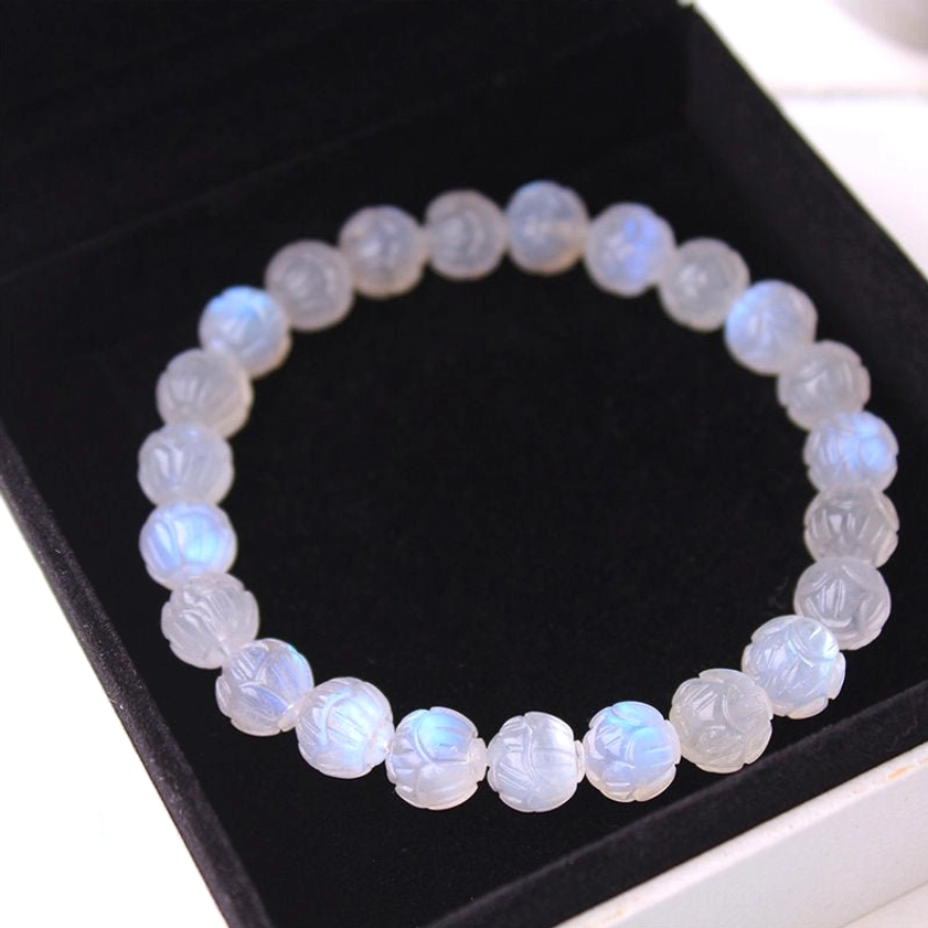 Natural moonstone round beads bracelet uniform size with obvious blue shimmer, translucent texture detail