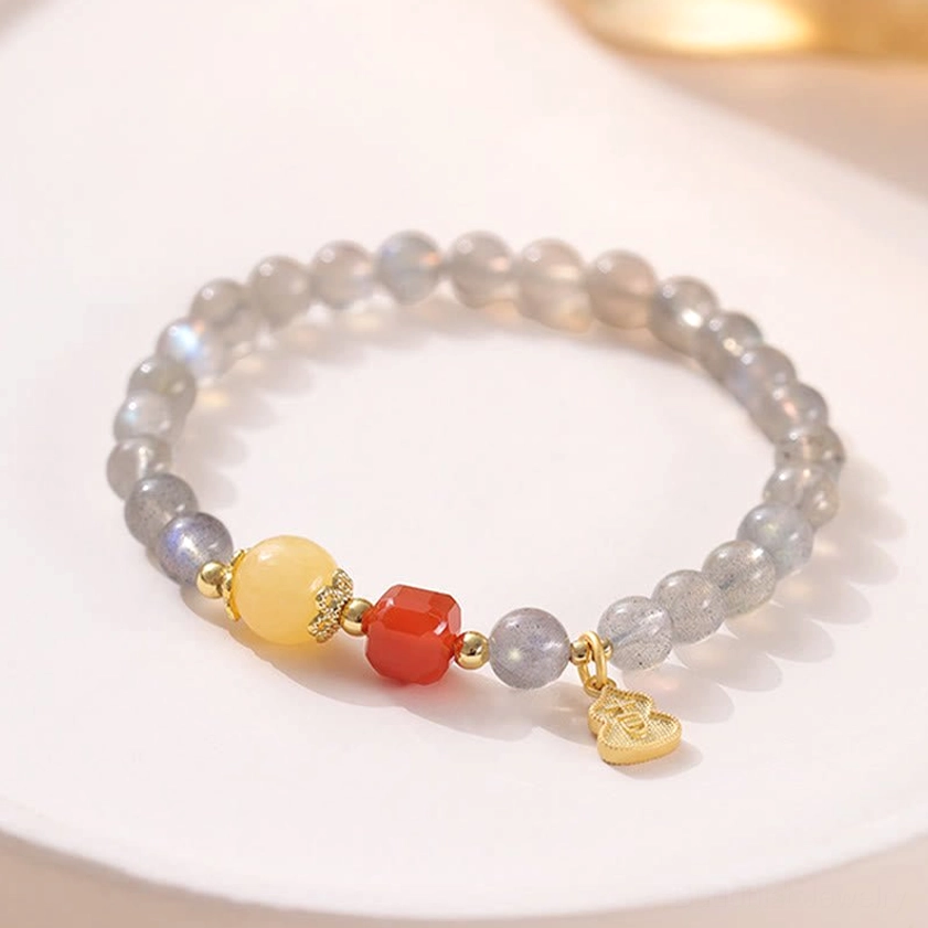 Moonstone and South Red Agate Buddhist bracelet variant with red agate beads combined with gray moonstone and gold accents