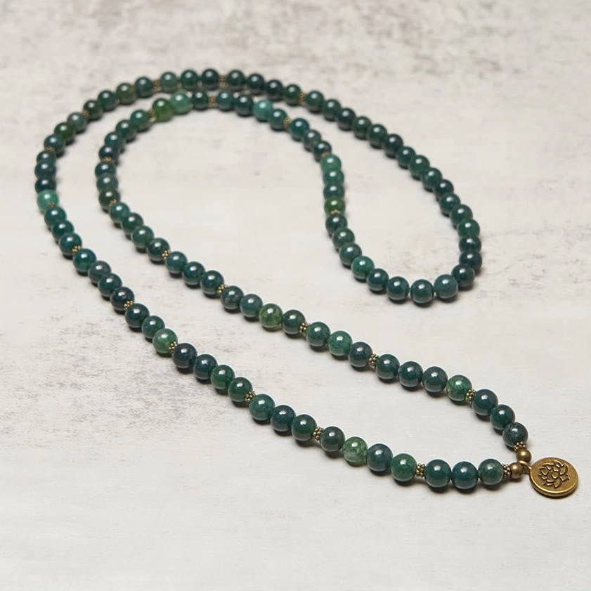 Full length moss agate Buddhist mala bracelet side view with dangling gold lotus charm, continuous green agate bead strand for spiritual practice