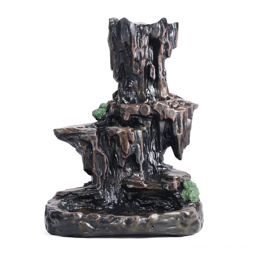 Buddhist backflow incense holder mountain tower design, weathered dark brown resin texture with green moss decoration, white background product view