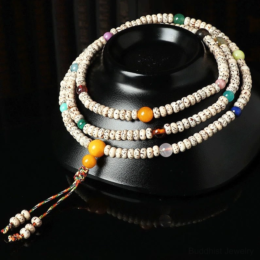 Multi-strand bodhi seed bracelets with star-moon beads and colorful braided tassel with charm accents