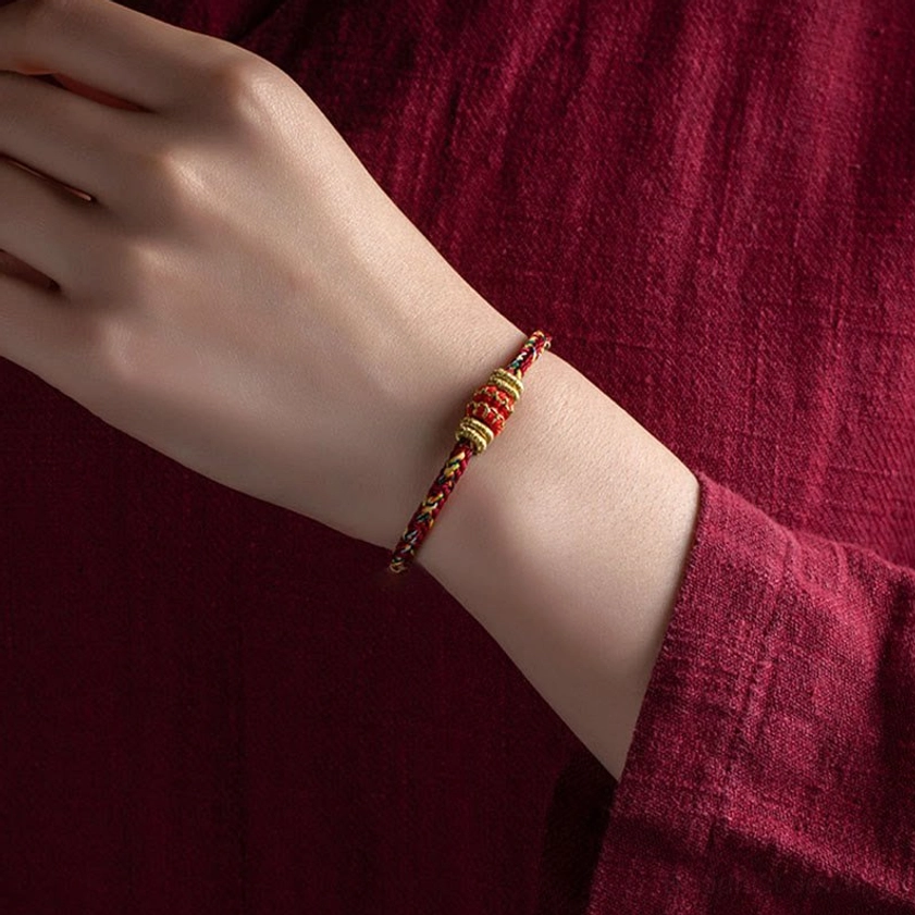 Multicolor woven buddhist string bracelet styled on wrist demonstrating comfortable fit