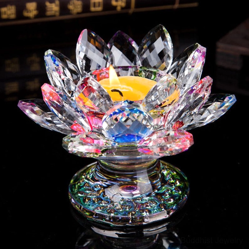 Multicolor crystal lotus candleholder with pink and clear petals, blue central crystal, and iridescent base
