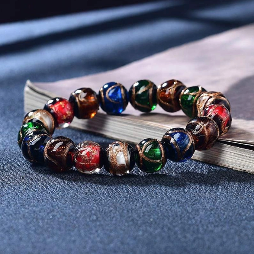 Colorful incense ash liuli glass bead bracelet with multicolor beads and gold accents, close-up detail view