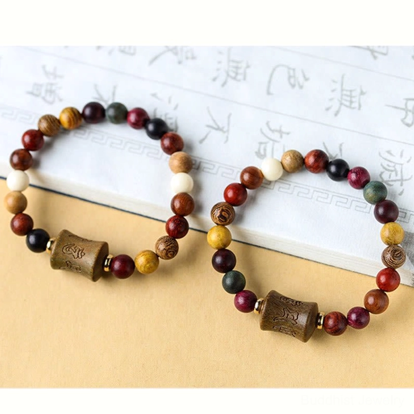 Multicolor sandalwood Buddhist bracelet with intricately carved Om Mani Padme Hum mantra and premium elastic band