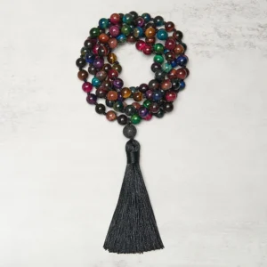 Multicolor tiger eye 108 bead Buddhist prayer mala with black tassel coiled flat lay