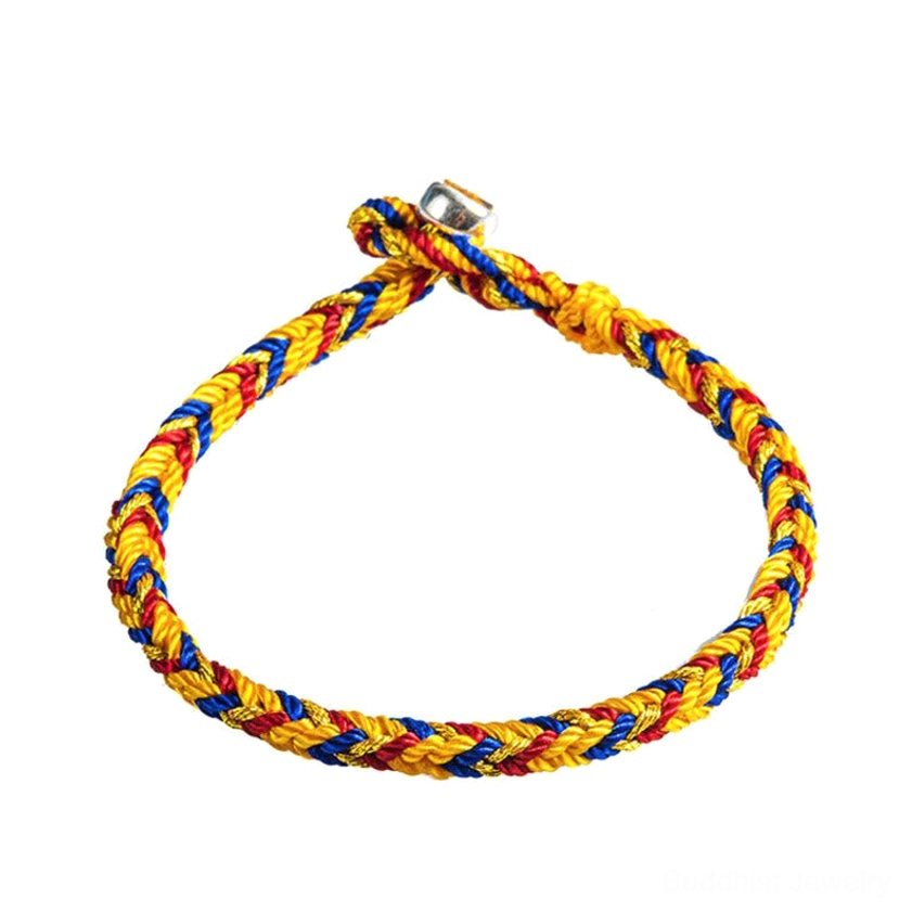 Clean white background display of handwoven multicolored Buddhist bracelet with clear braided texture and silver toggle clasp