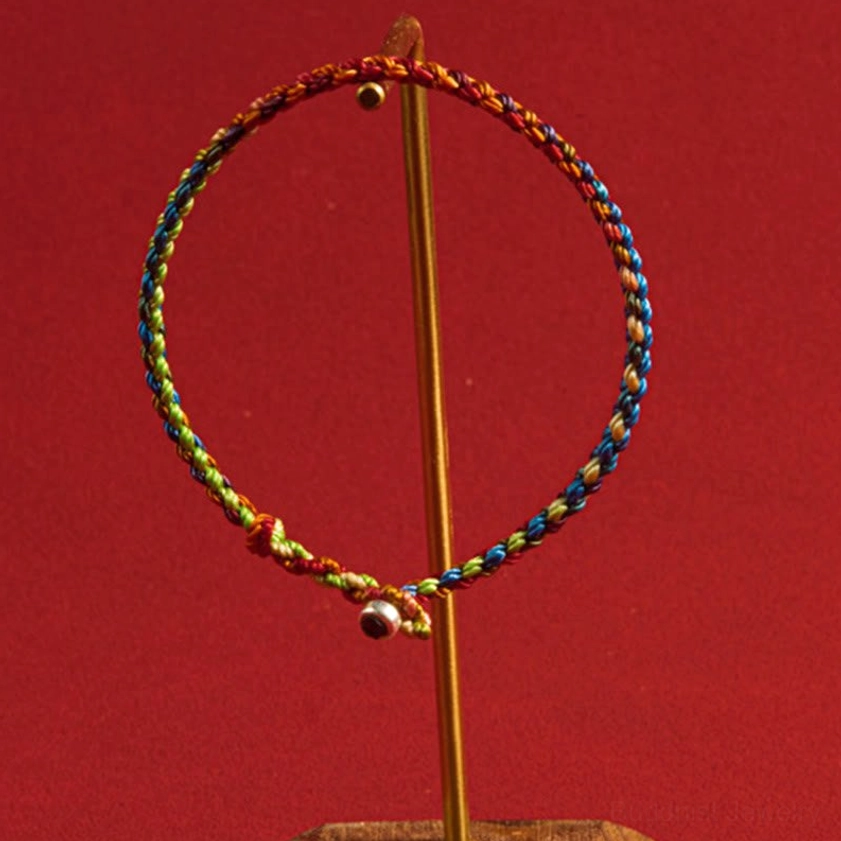 Multicolored Buddhist string bracelet for protection and peace, ideal for meditation and spiritual practice