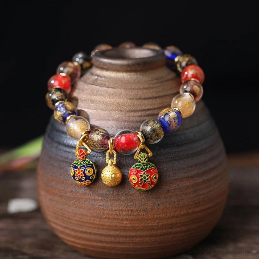 Multicolored Liuli glass bead bracelet featuring multiple colored beads with gold-plated Pixiu wealth guardian charms - diverse Buddhist blessing bracelet