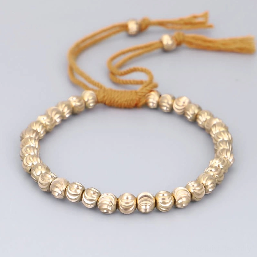 Mustard yellow handmade copper bead bracelet with smooth round beads, adjustable fit