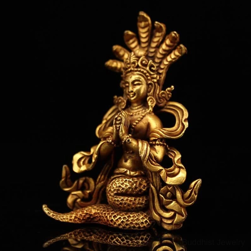 Right side view of Nagarjuna Buddha copper sculpture with flowing decorative scarves and beaded jewelry details