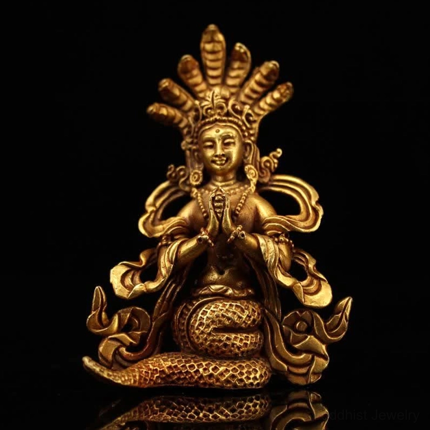 Full frontal view of Nagarjuna Bodhisattva copper statue with symmetrical decorative scrolls and golden finish