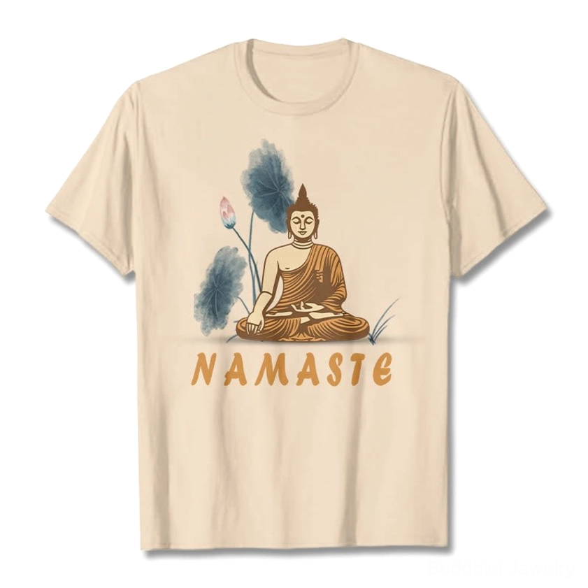 Namaste Buddha Lotus T-Shirt front flat lay featuring beige cotton with seated Buddha, sacred lotus leaves, and Namaste text print