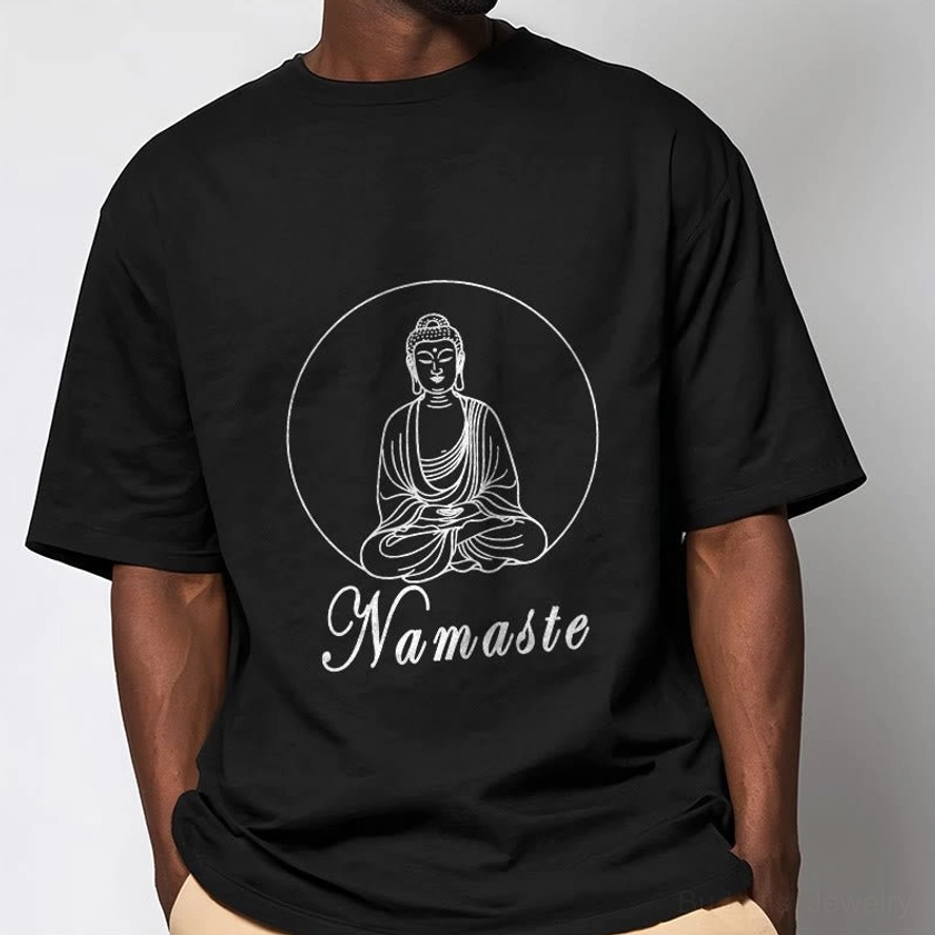 Male model wearing black Namaste Buddhist T-shirt upper body front shot showing relaxed fit unisex style