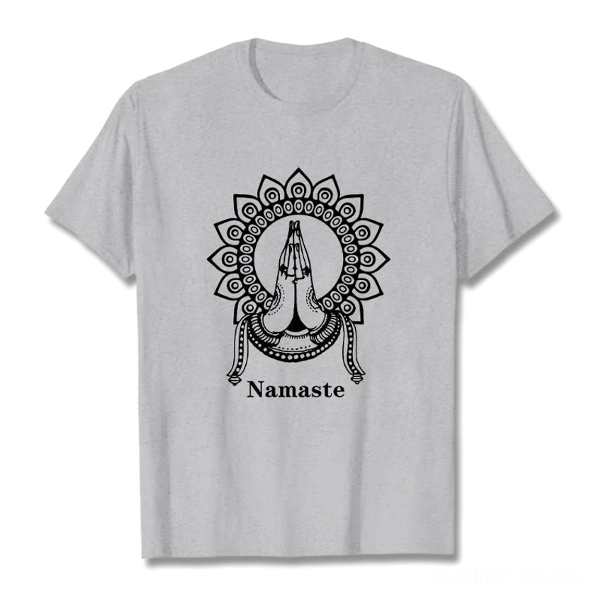Female model front view wearing light gray Namaste mandala prayer hands Buddhist tee with relaxed unisex fit