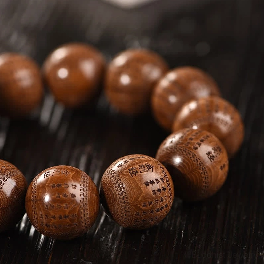 Natural wood Buddhist bracelet showing authentic patina and aging of Abelia Biflora material