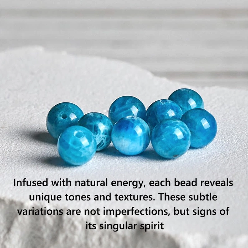 Natural loose apatite gemstone beads in blue, showing authentic color variations and texture of the raw materials used in this handmade bracelet