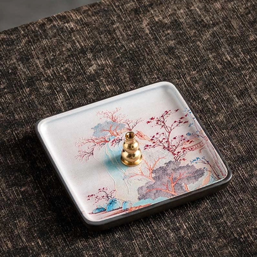 Natural ceramic incense burner designed for stick and coil incense with artistic Buddhist imagery