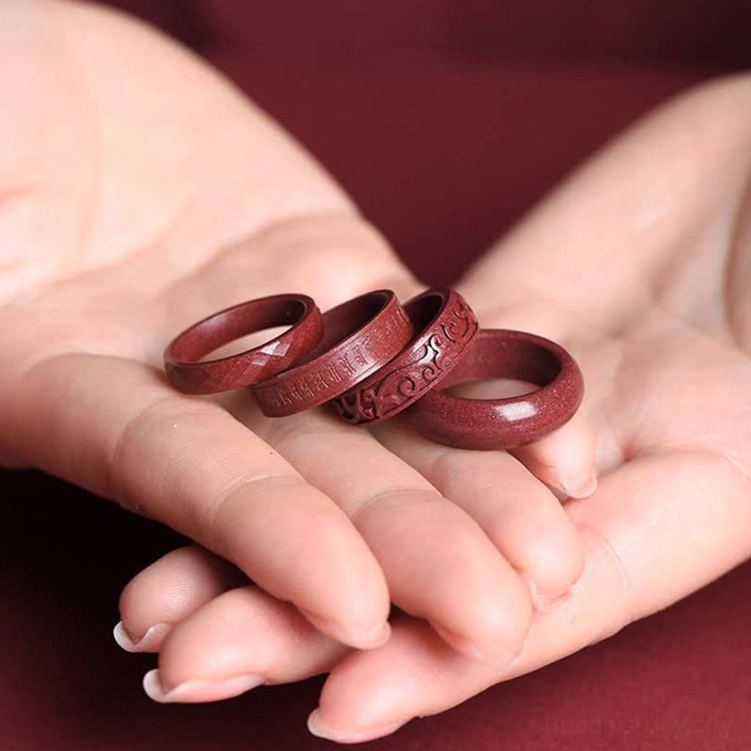 Natural cinnabar stone blessing ring showcasing authentic mineral properties and traditional Buddhist spiritual craftsmanship