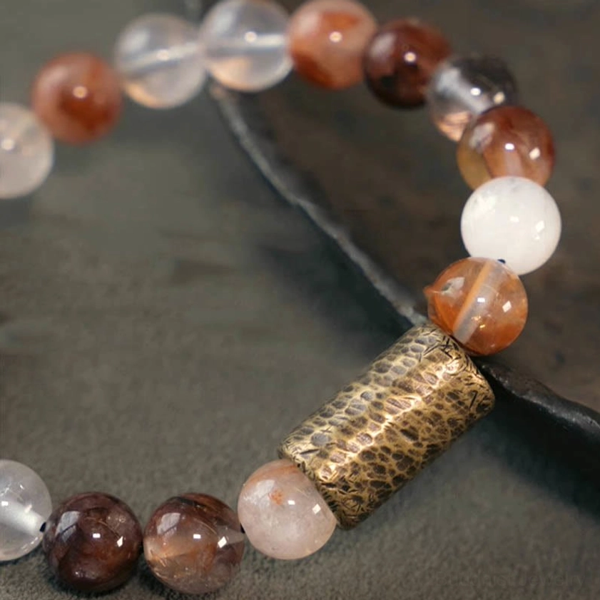 Natural clear quartz beads bracelet showing transparent crystalline structure and authenticity