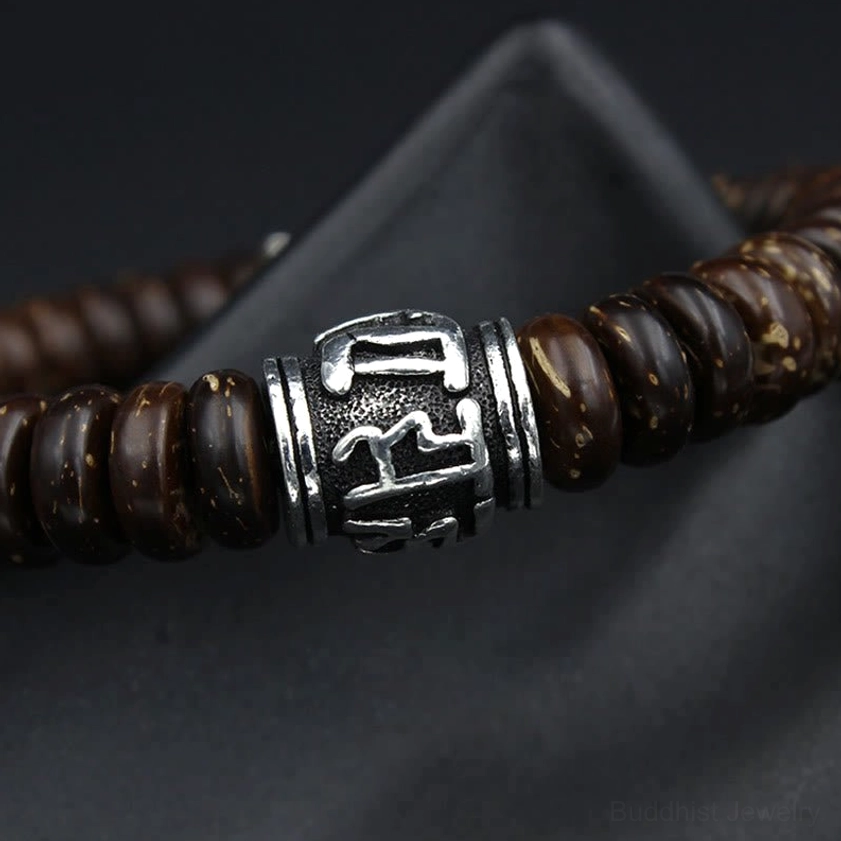 Natural coconut shell Buddhist bracelet representing inner peace, positive energy, and spiritual awakening