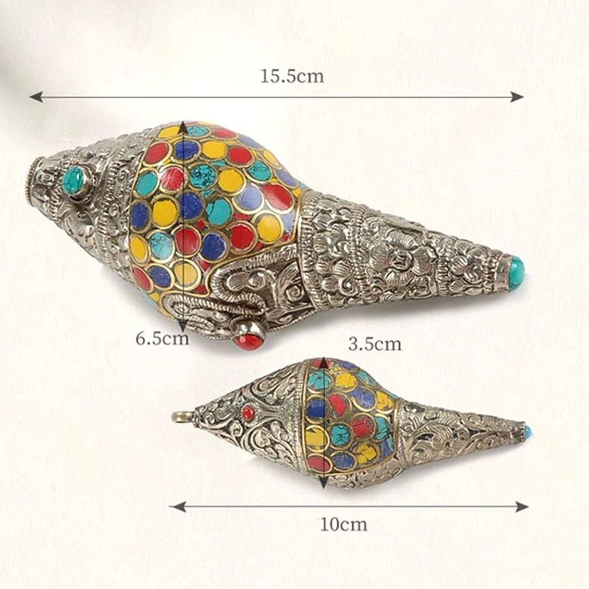 Natural conch shell shankha decoration with hand-carved silver details and multicolor gemstone inlays