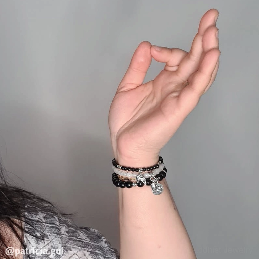 Natural gemstone healing bracelet featuring amethyst, obsidian and quartz beads with silver charms - meditation jewelry