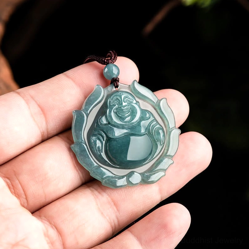Jade laughing Buddha necklace worn in hand showing scale and quality of handmade pendant