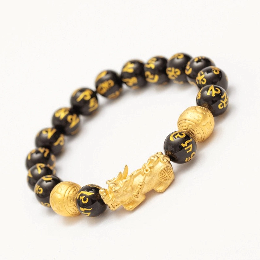 Handmade natural black obsidian beads with authentic stone pattern variation in Pixiu wealth bracelet
