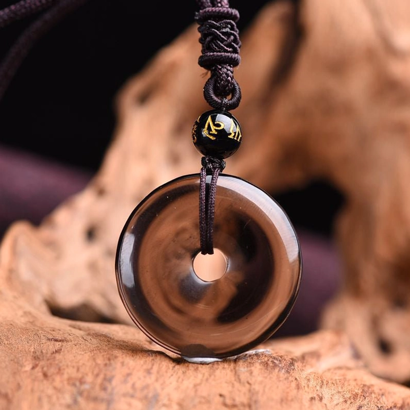 Natural obsidian donut pendant necklace translucent finish braided cord