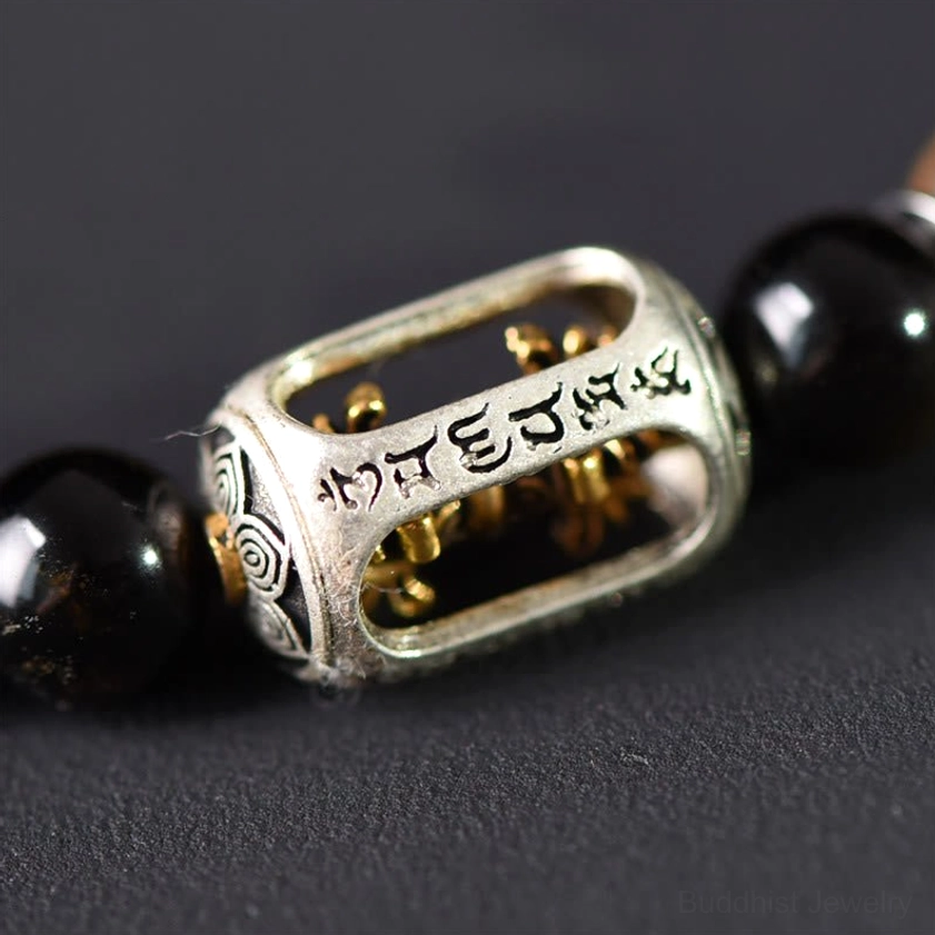 Green sandalwood beads transitioning through natural color stages showing authentic aging process