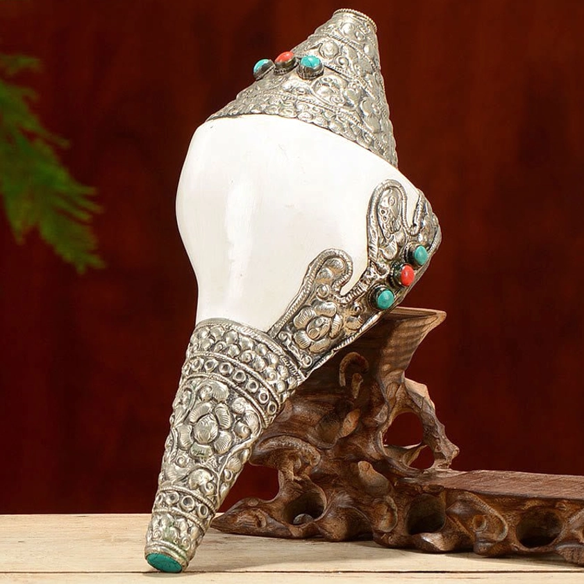 Natural white shankha conch with sterling silver inlay showing traditional Buddhist auspicious symbol craftsmanship