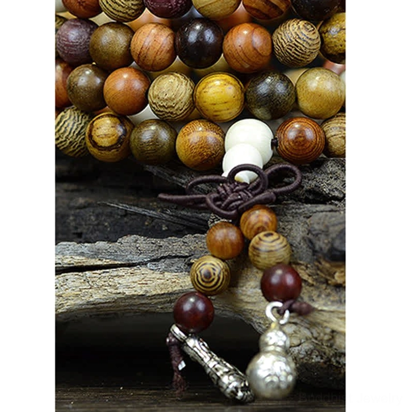 Buddhist prayer mala with natural wood beads and silver metal ornaments, versatile spiritual practice meditation tool