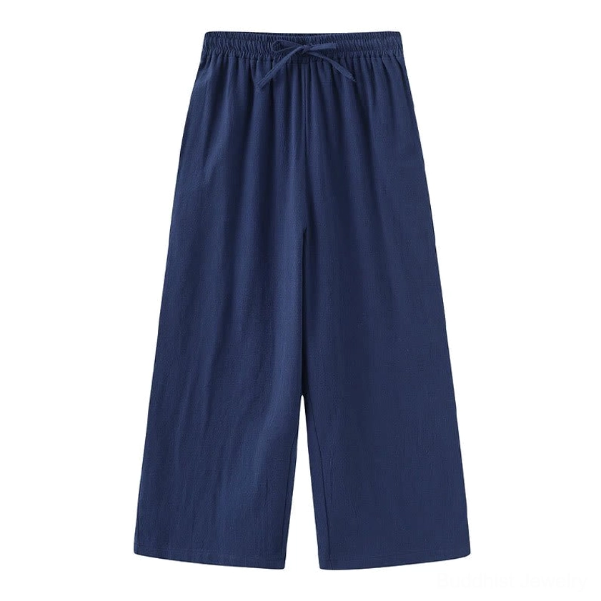 Navy blue drawstring meditation pants with relaxed wide-leg silhouette