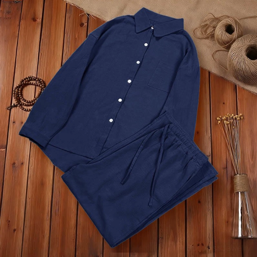 Navy blue meditation clothing set front view on neutral background