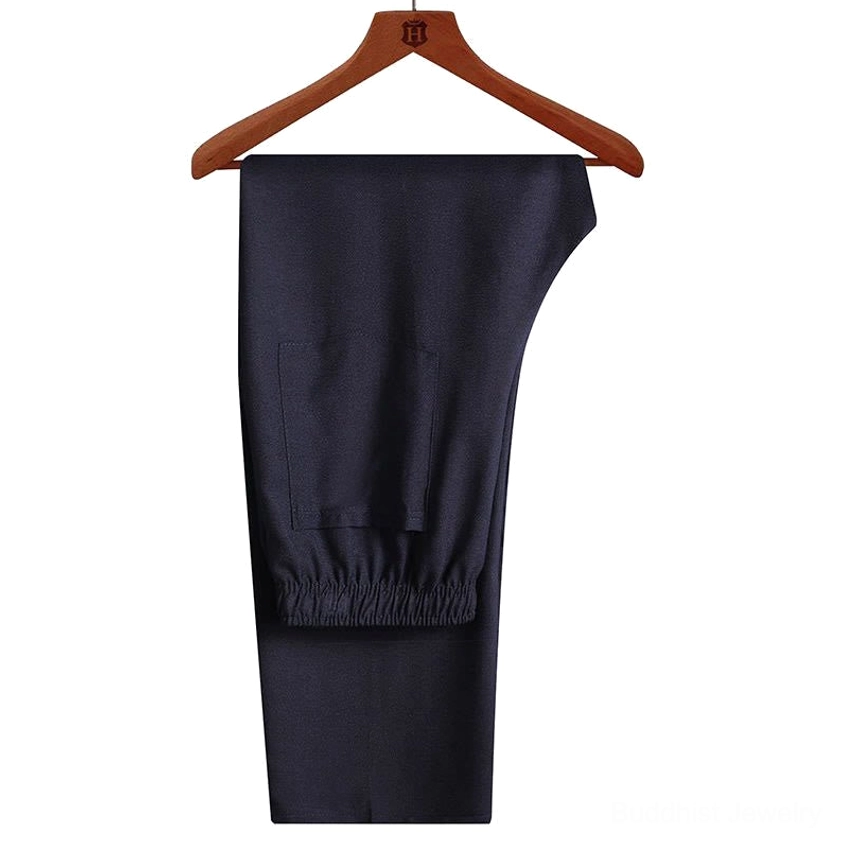 Navy Tang suit pants with elasticated waistband and front pockets - side view