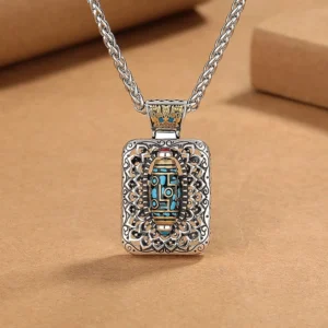 Nine-Eye Dzi Bead rotatable copper pendant necklace front view with intricate carved design, nine-eye Buddhist symbol, 360-degree rotating mechanism